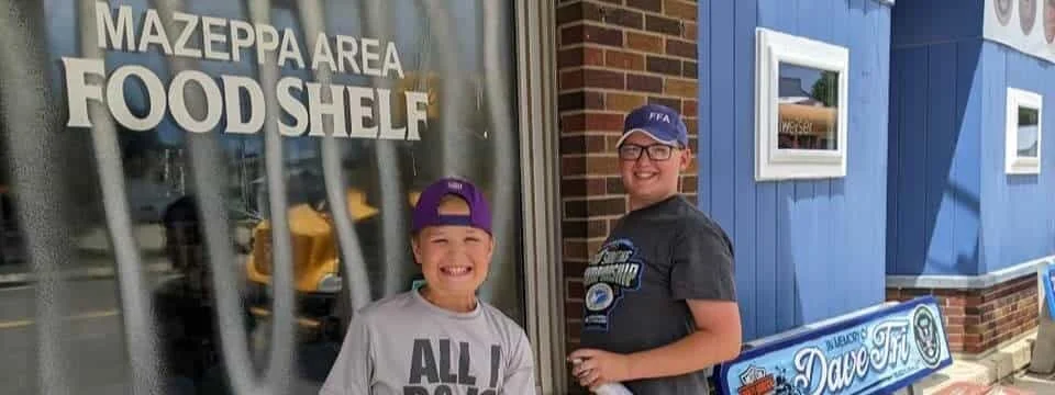 Volunteers outside the Mazeppa Area Food Shelf.